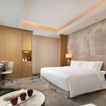 Yun Hotel Ухань Экстерьер фото